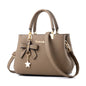Elegant Messenger Bag – Flower Pendant Shoulder Tote